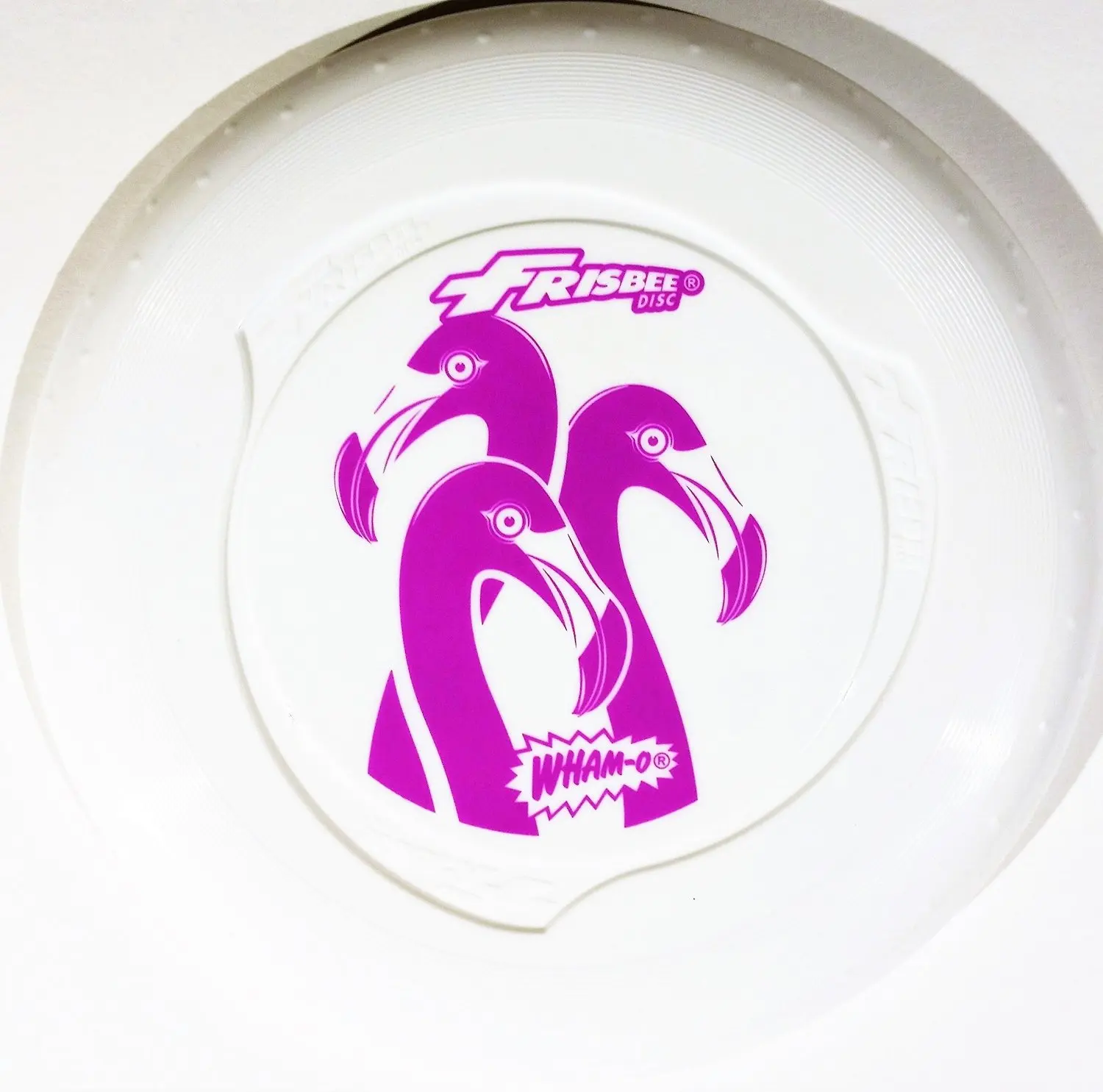 Wham-O Fun Flyer Frisbee Disc in White with 3 Pink Flamingoes Design