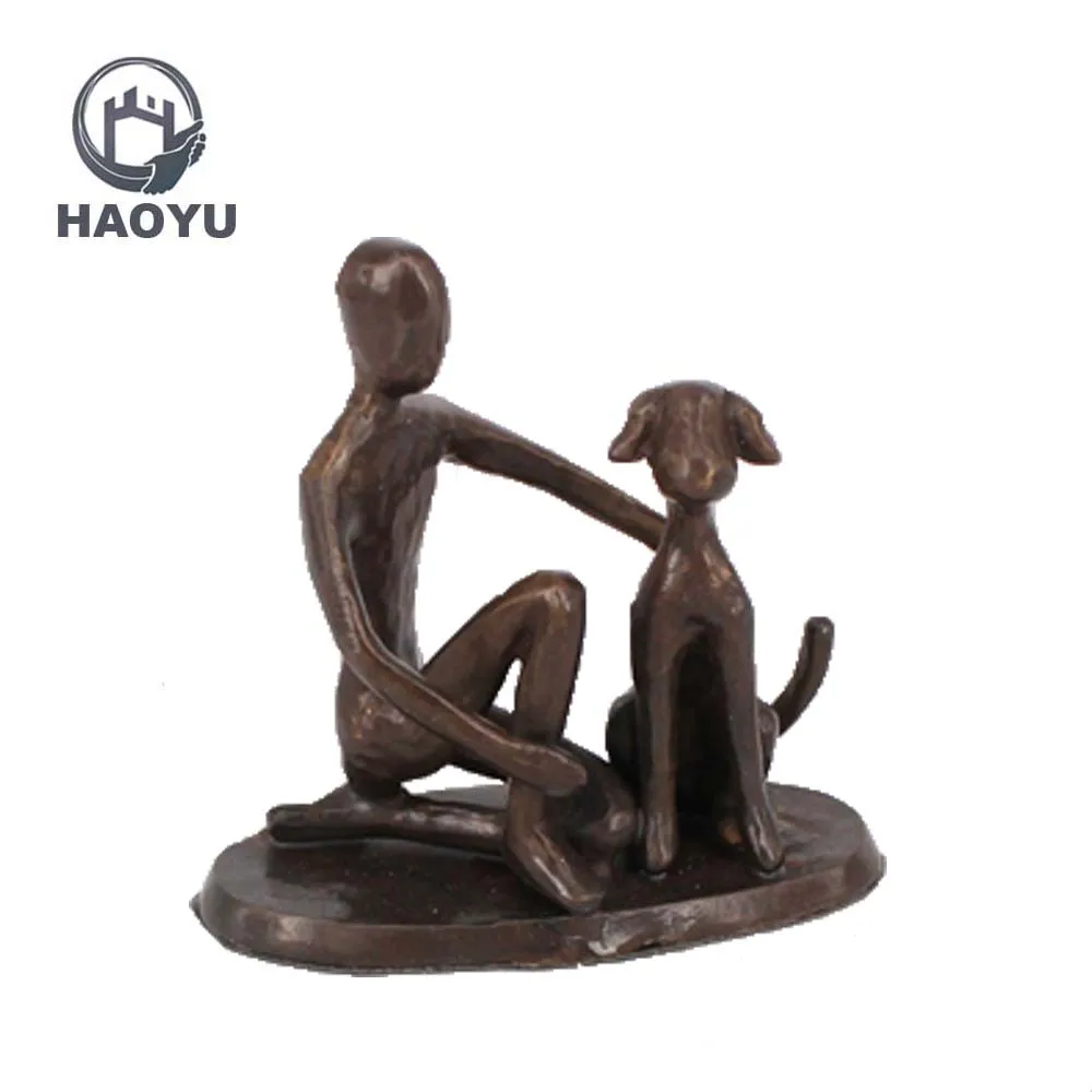 boy and dog statues