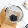 Large Stainless Steel Fine Mesh Strainer with Reinforced Frame and Black Plastic Handle Grip - Designed for Chefs and Commercia