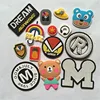 Eco-friendly custom children's wear hat PVC plastic tag garment label rubber clothes shoes cap bag trademark with hook&loop