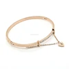 In Stock - MSX Jewelry Stainless Steel 30% Off SALE Vintage Ladies Bangle Complete With Safety Chain Featuring Heart
