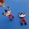promotional custom robot shape soft pvc key trinket keychain