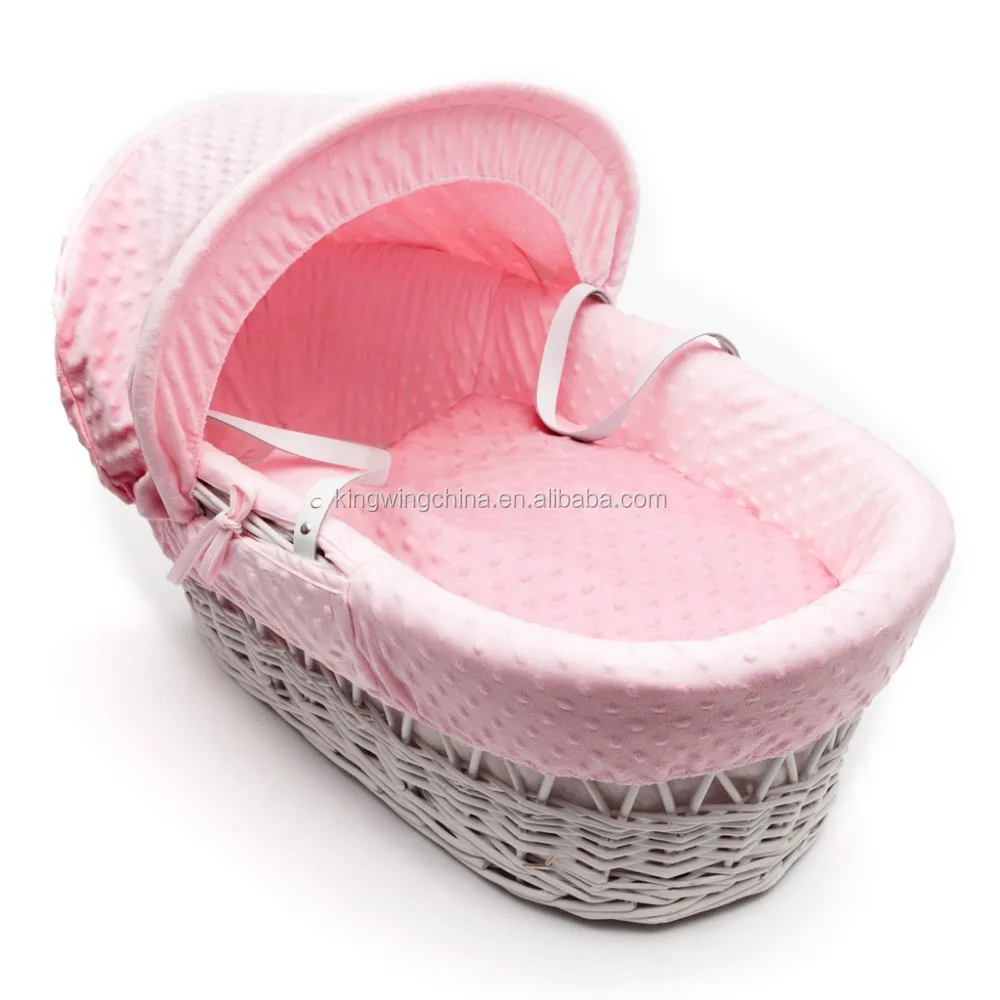 pink and white moses basket