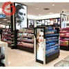 Top quality cosmetic shop interior design make up products display rack