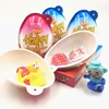 Happy big surprise egg with chocolate biscuit and funny monkey toy