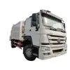 Sinotruck 4x4 off raod compression refuse collectorrubbish garbage compressor garbage bin truck manufacturer