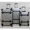 Handmade carry-on old style rolling suitcase