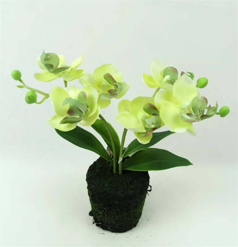 large artificial flowers in vase