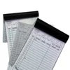 Carbon coated paper two part restaurant guest check for kitchen with stapled binding