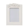 white resin embossed flower shape photo frame