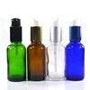 /product-detail/cosmetic-packaging-5ml-10ml-15ml-20ml-30ml-50ml-100ml-clear-green-cobalt-blue-amber-glass-bottle-with-treatment-pump-lotion-60765510873.html