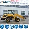 TL1500 telescopic boom loader with grass fork