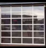 Clear acrylic garage doors with pedestrian access door for sale