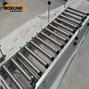 Roller conveyor for feeding other machine to slide on it
