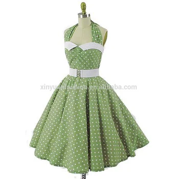 green dress with white polka dots