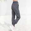 Hot selling Loose sports trousers women's running quick-drying fitness pants folds drawstring belt widening closed yoga pants