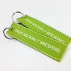 Wholesale high quantity Cheap Fabric Custom Patch Embroidery Embroidered Keyring Keychain