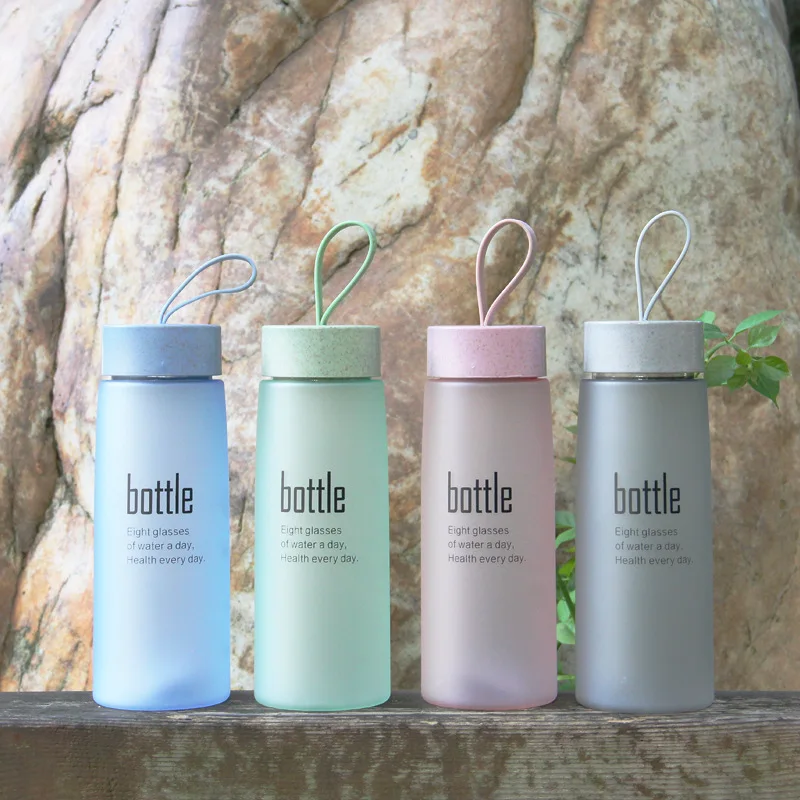 Eco-friendly 520ml frosted glass water bottle with rope water bottle wholesale