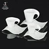 Factory oem custom white ceramic wave shape coffee cups with handle