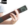 /product-detail/2019-new-6-fret-hand-type-chord-conversion-exercise-tool-portable-pocket-guitar-with-chord-table-60523255699.html