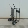 tree farm use hand truck for firewood