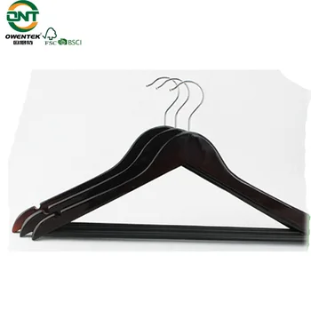 black wooden coat hangers