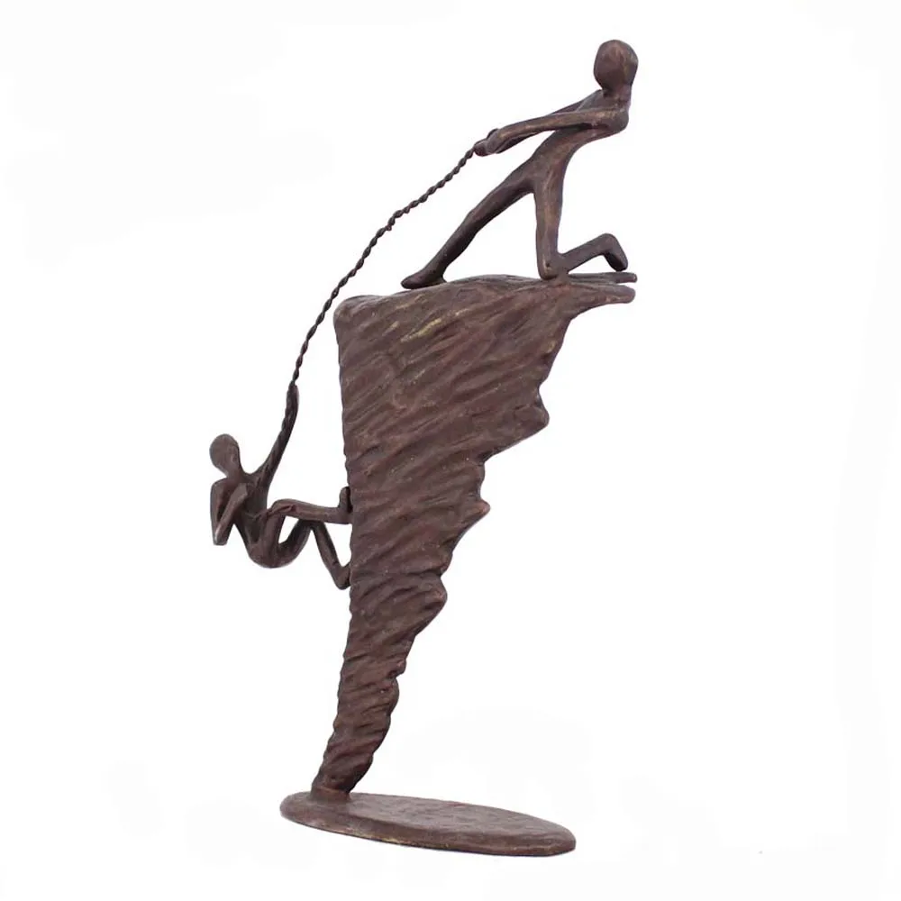 Metal antique bronze rock climbing statues