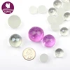 Clear and frosted glass marbles with colorful acrylic ball
