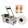 Glass botteling filling machine for liquids, manual bottle capping machine with sticker label function