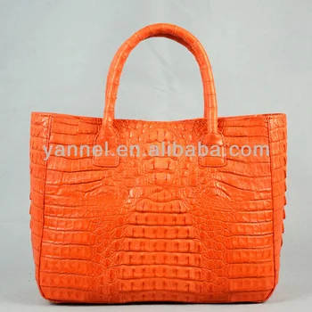 orange crocodile bag