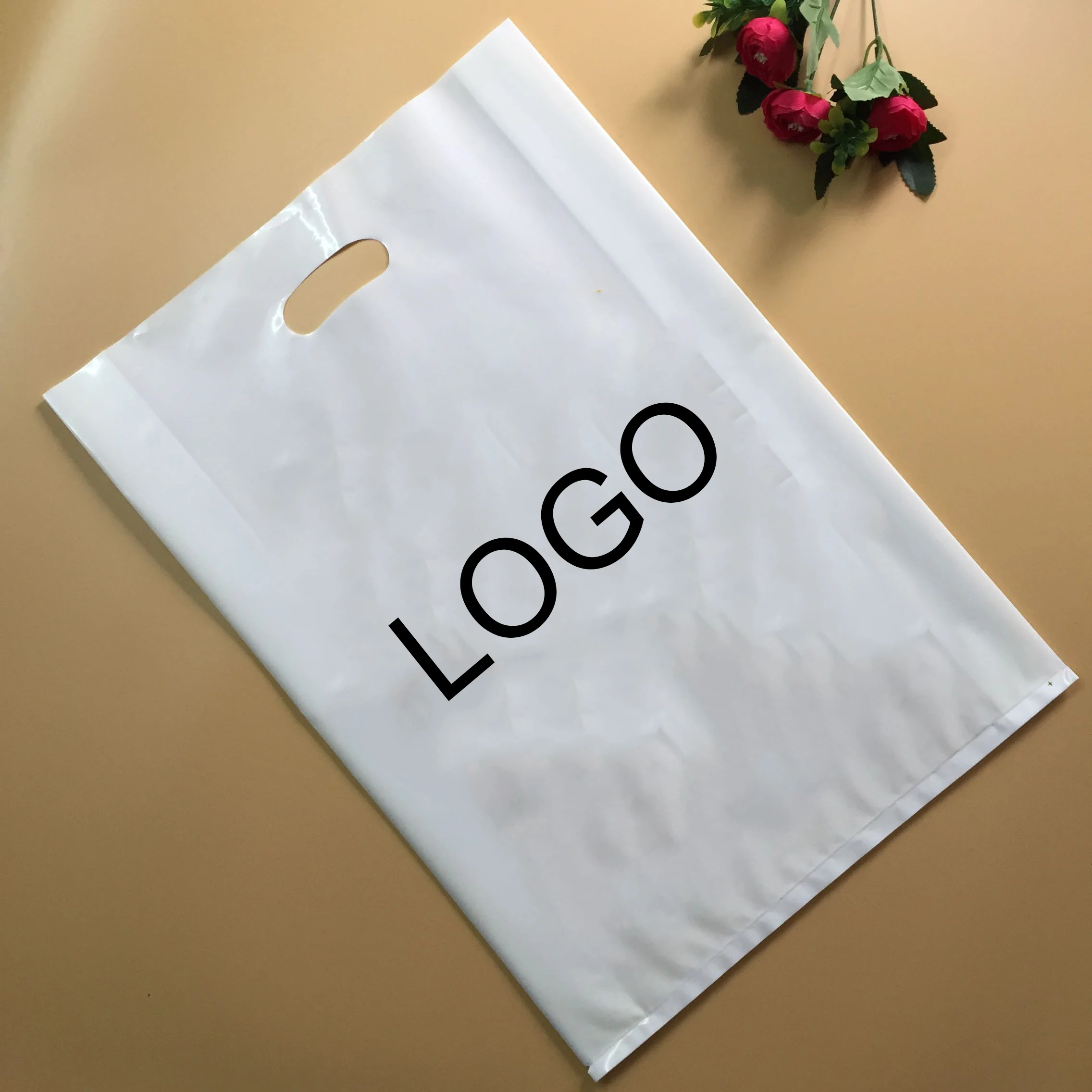 Oem Custom Logo Patch Handle Plastic Packaging Bag - Buy Plastic Bag ...