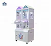 Popular 2 player Mini cabinet doll catching machine toy claw crane lifting machine for sale