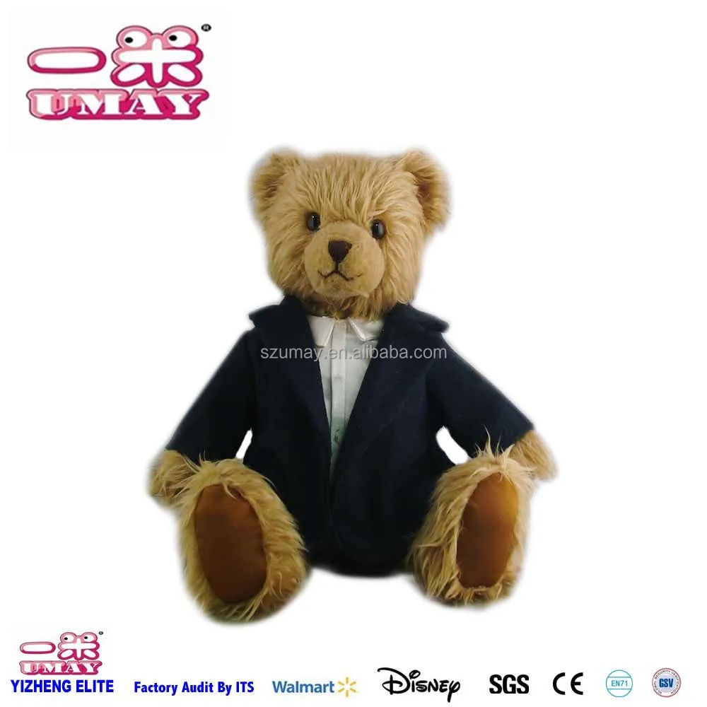 teddy bear wearing a suit