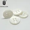 Wholesale all kinds of natural shell buttons freshwater pearl river shell thin edge four hole white shirt buttons