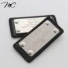Factory Custom Silver Metal Plate Black Genuine Leather Clothing Label Patch With Merrow Border