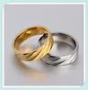 Top quality goods latest design gold and silver titanium steel couple rings
