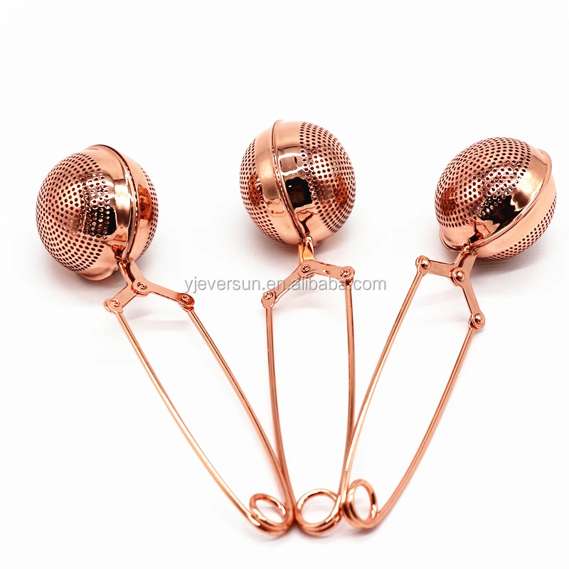 Good Karma tea infuser ball scoop and a strainer rose gold color
