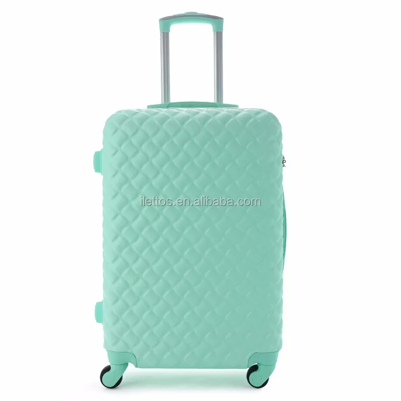 green luggage set