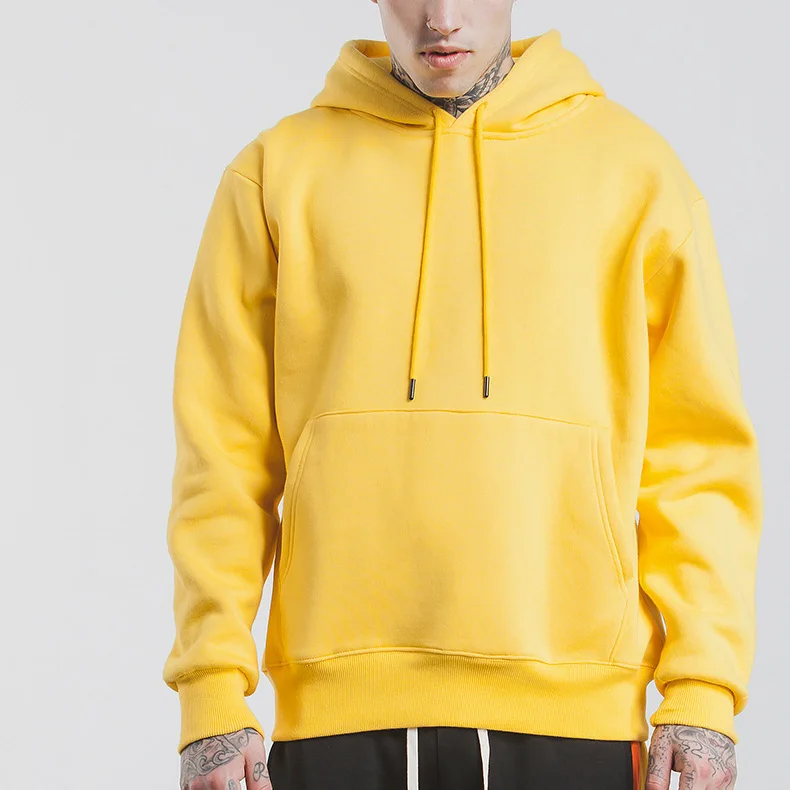 yellow pullover sweatshirt