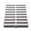 Swimming pool surround overflow drain grate