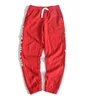 Mens red lettering printed slacks wholesale custom jogger pants
