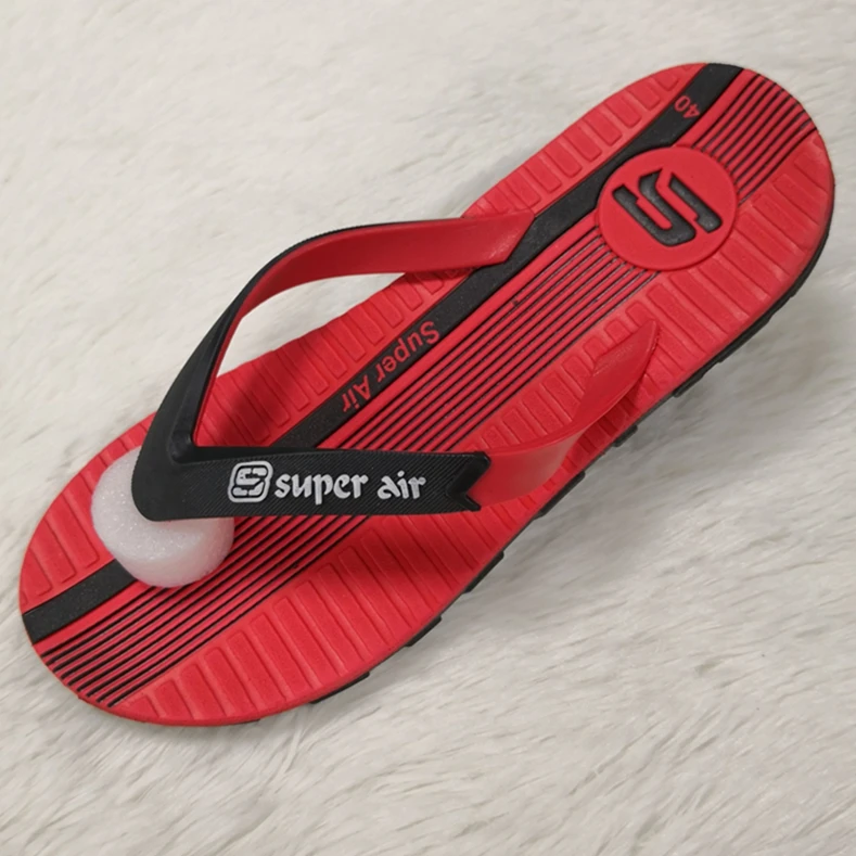 black plastic flip flops