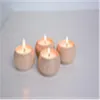 set of 4 round beech wood tealight candle holders