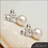 Chic bow tie 925 silver nature round stud earring models in pearl