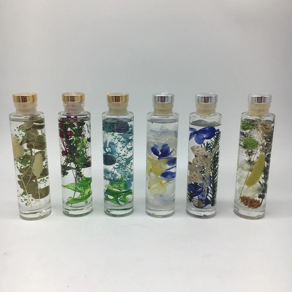 Fashion Home Decorative Glass Oil Floating Bottle With Dried Flowers For Home Decor Set