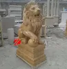 stone sitting lion with ball statue