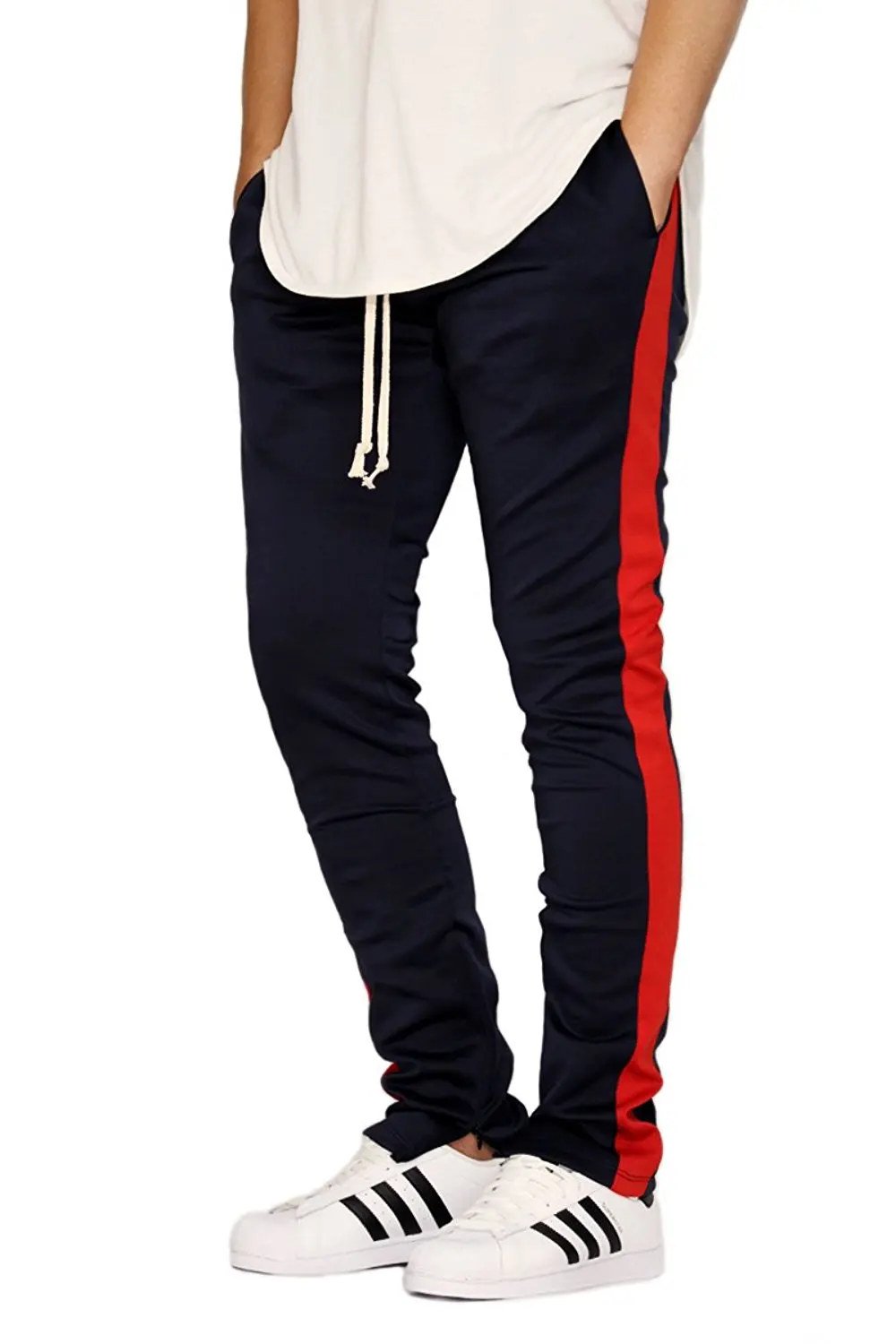 blue track pants with red stripe