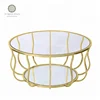 Modern golden stainless steel and glass top iris coffee table