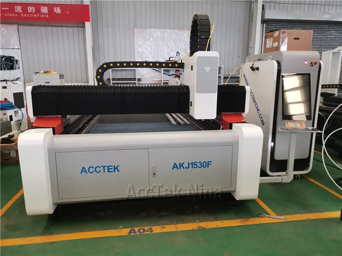 China 1000W fiber laser cutting machine cut 12mm carbon steel with exchange table