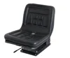 Shock absorber tractor seat with slide